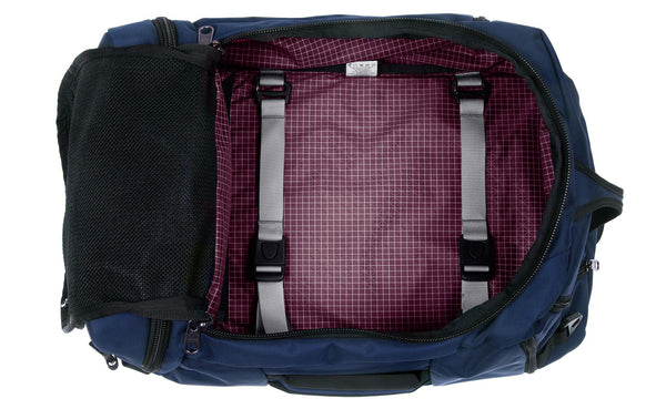 An open Techonaut 45 with a Deep Blue (dark blue) exterior and a Acai (purple) interior.